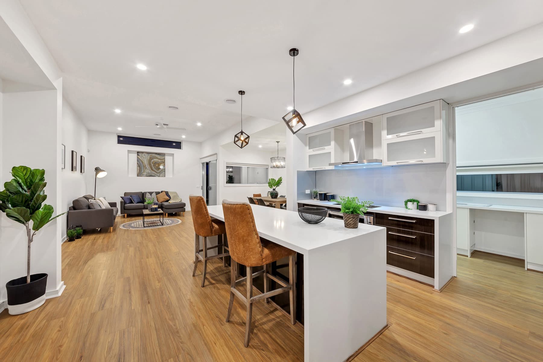 The kitchen island and living area in one open line