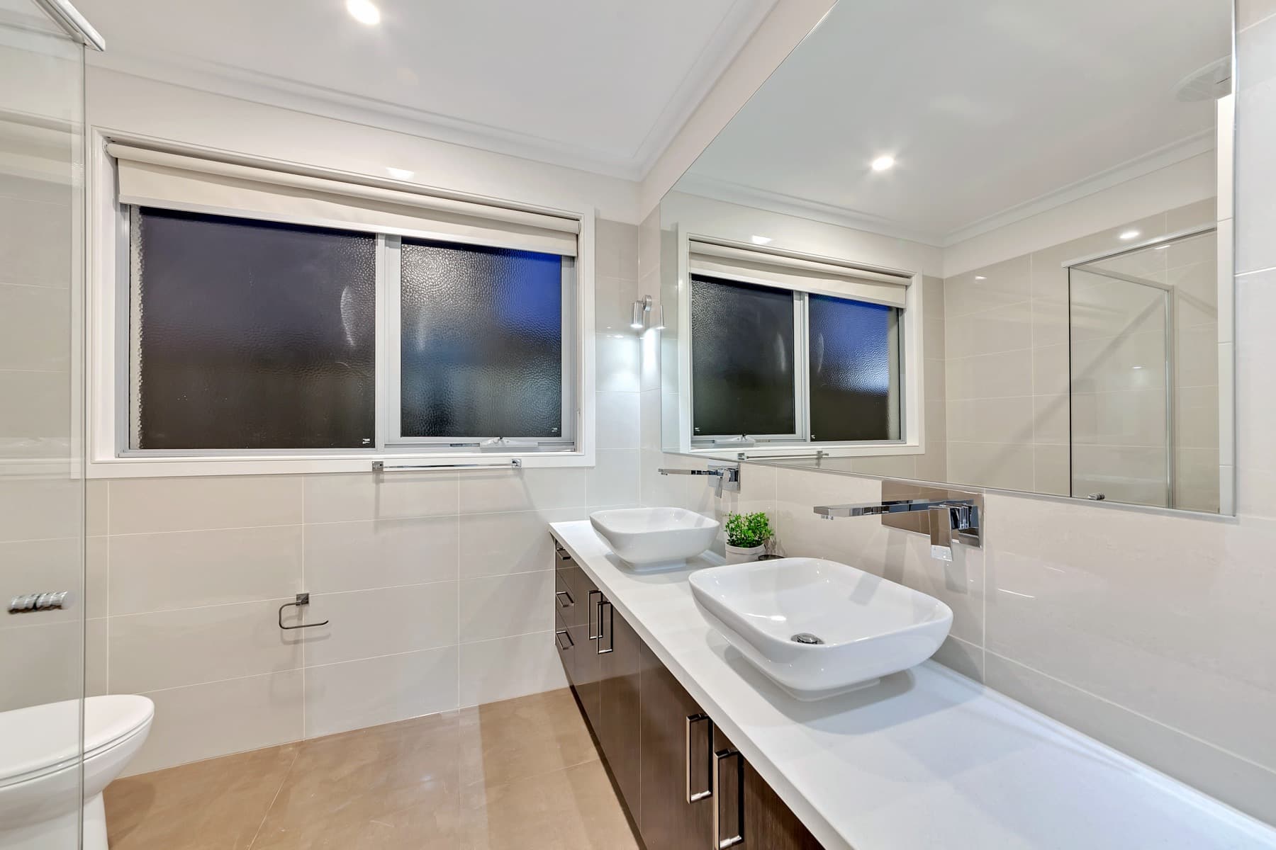 A bathroom vanity and basin