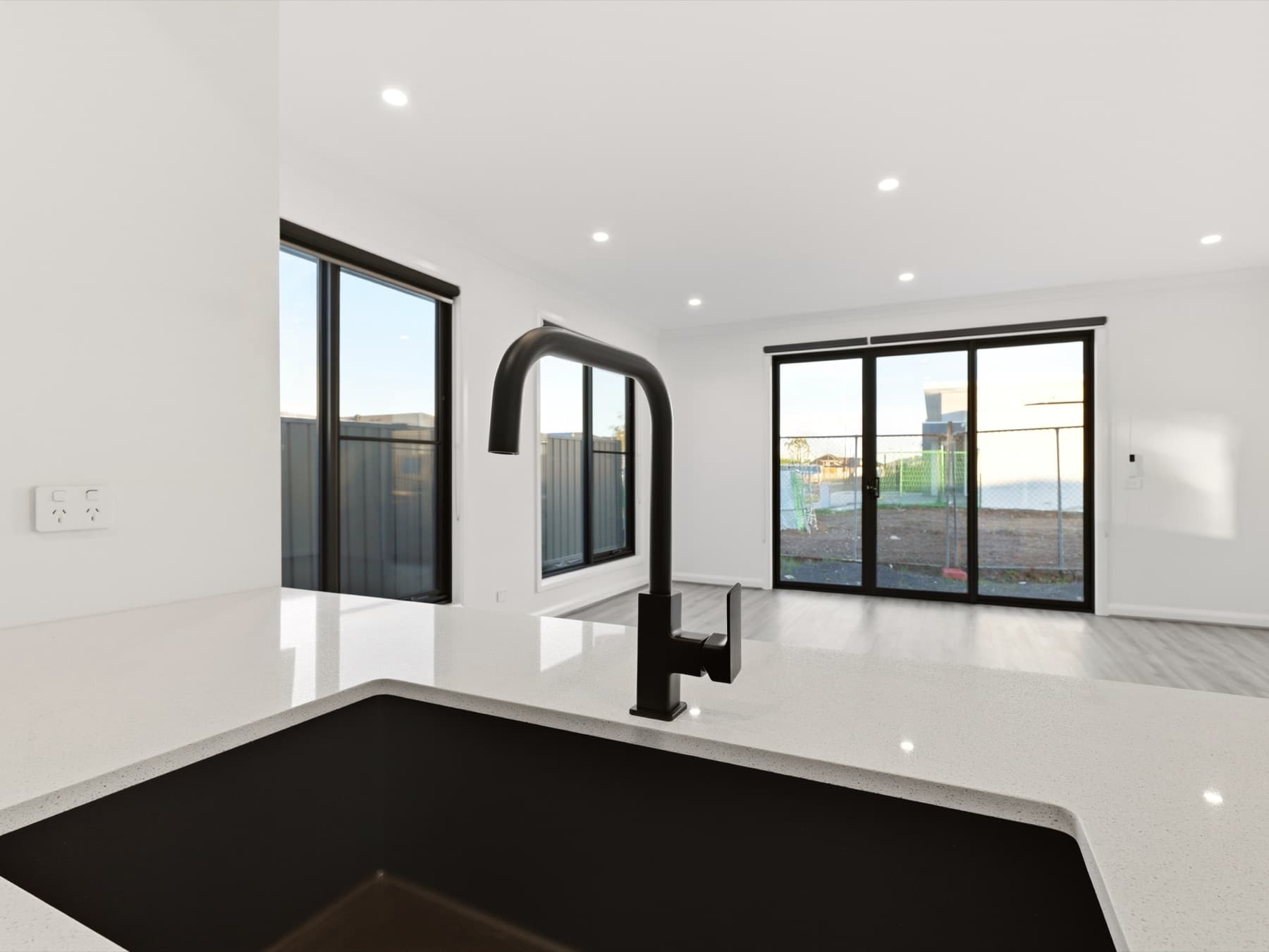 From the kitchen sink through to the living area doors
