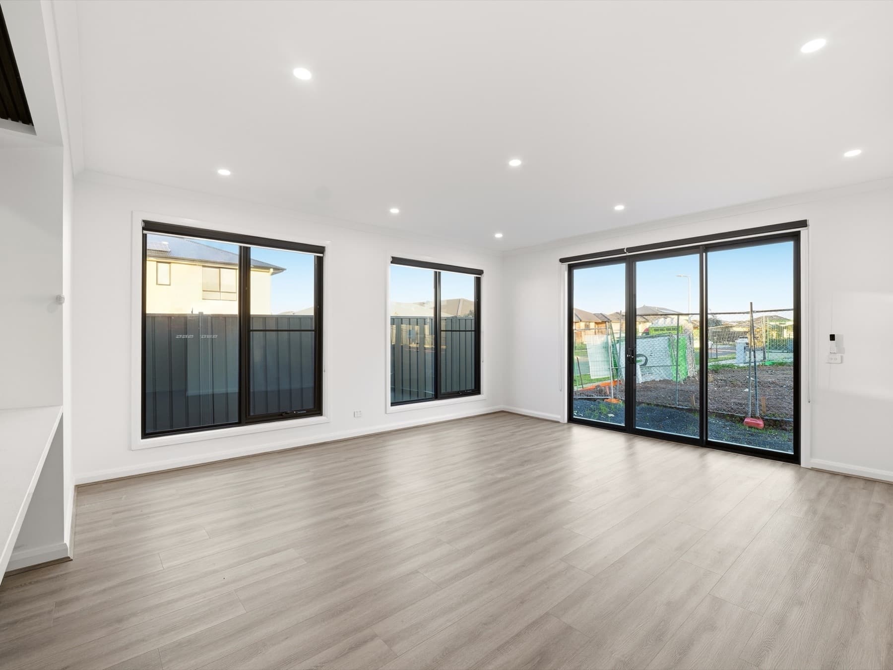 The living area, glazed on two sides with sliding doors to the yard