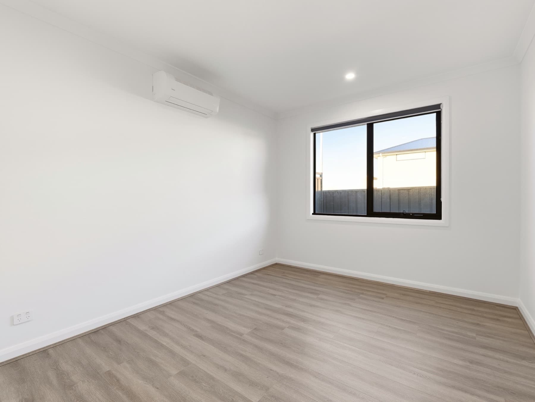 A bedroom at handover, finished and empty
