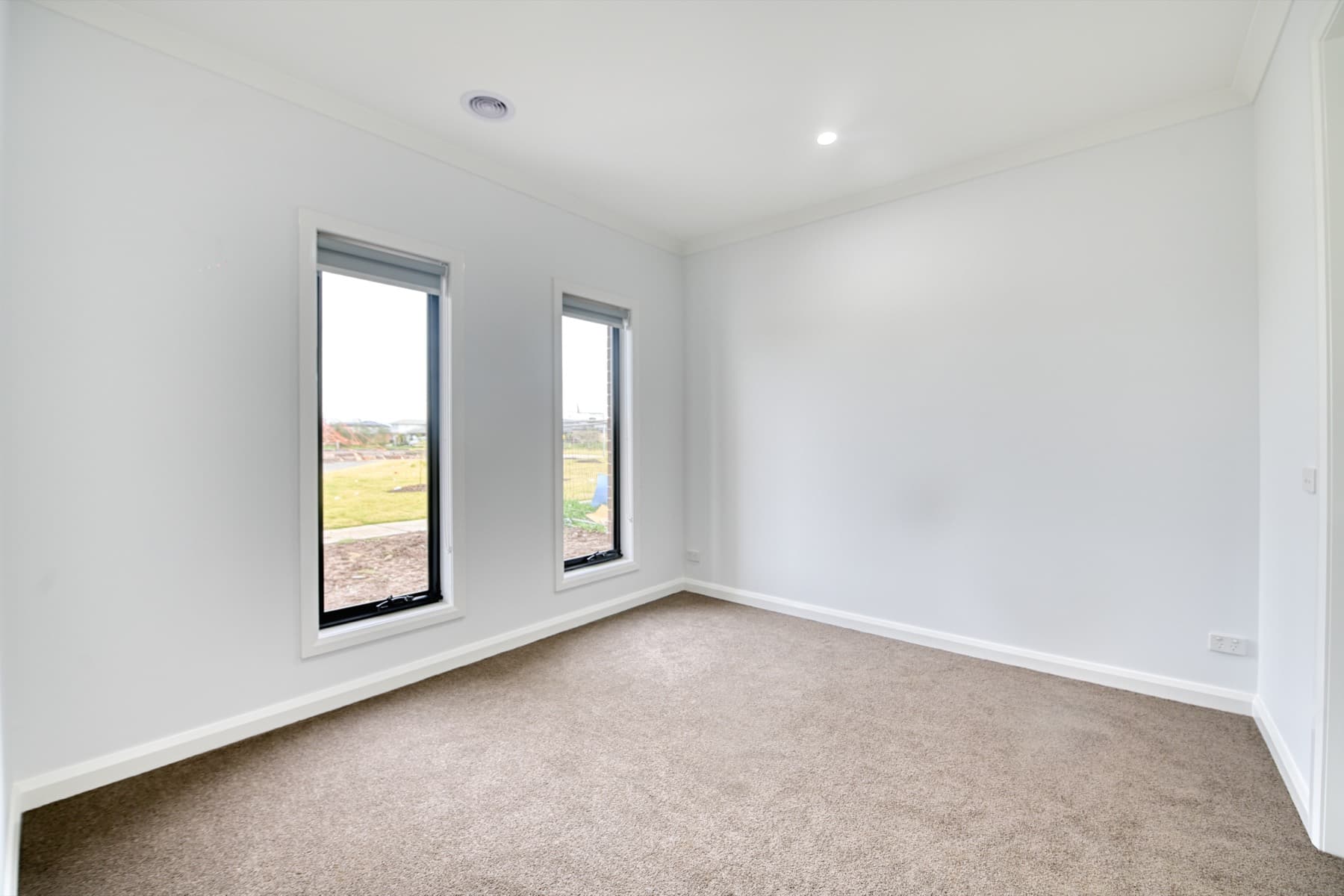 A carpeted bedroom