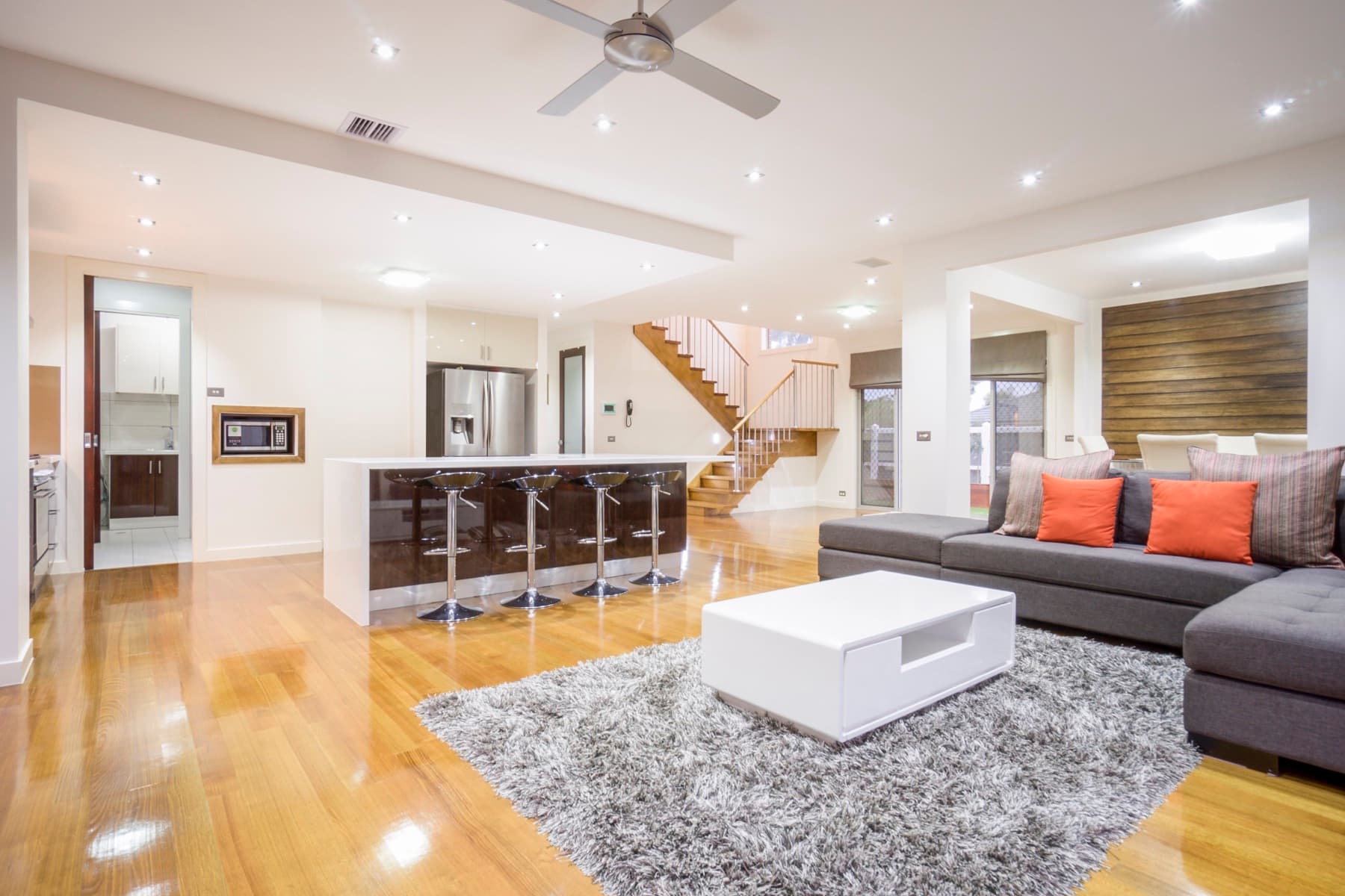 The living area, kitchen and stair in one frame