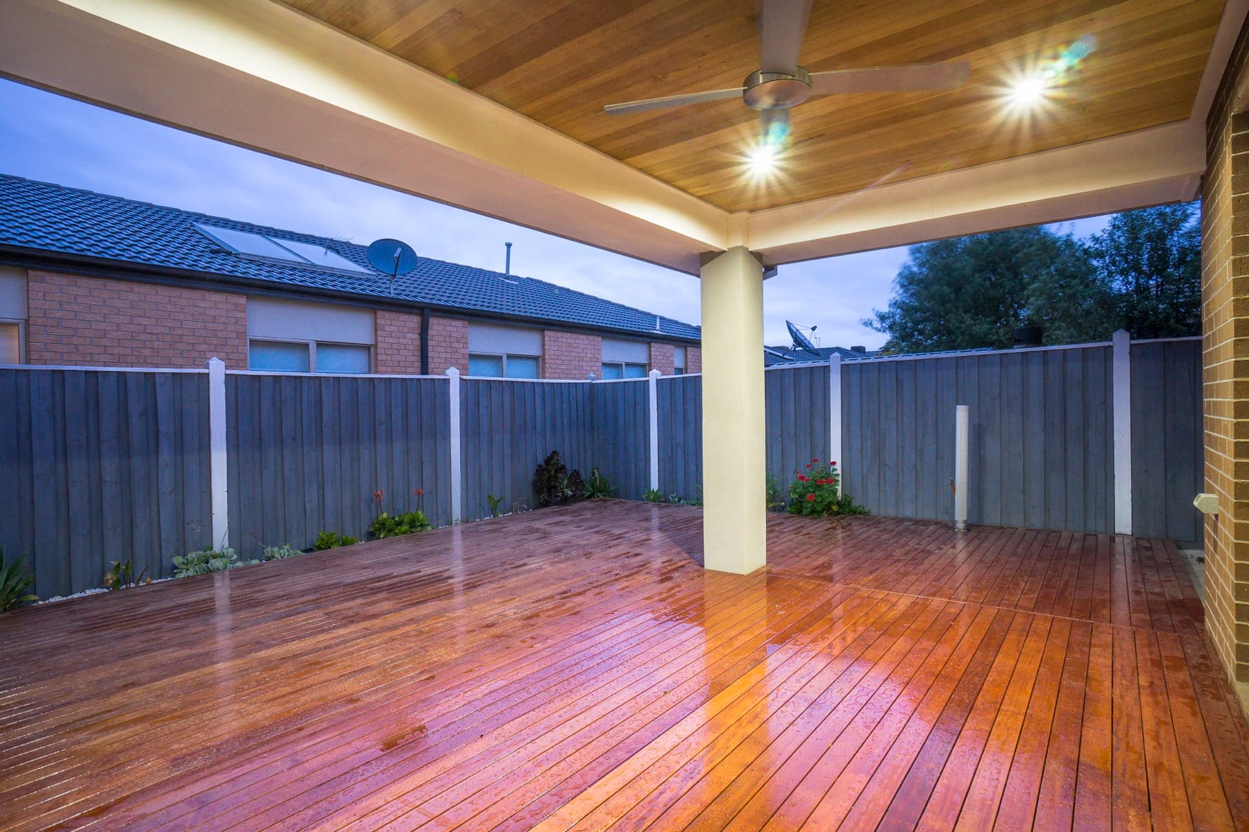 The covered rear deck at dusk