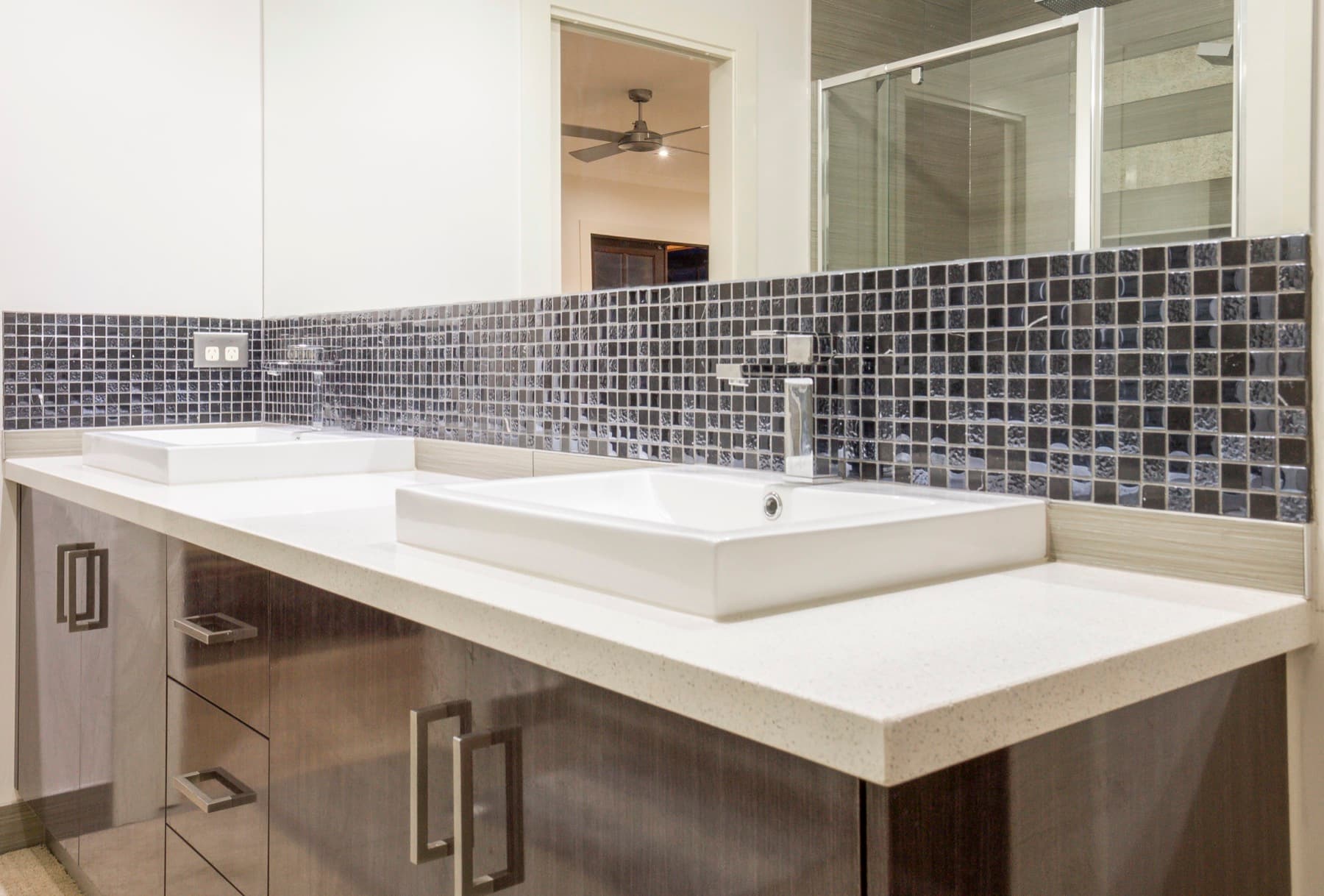 Twin basins over mosaic tiles