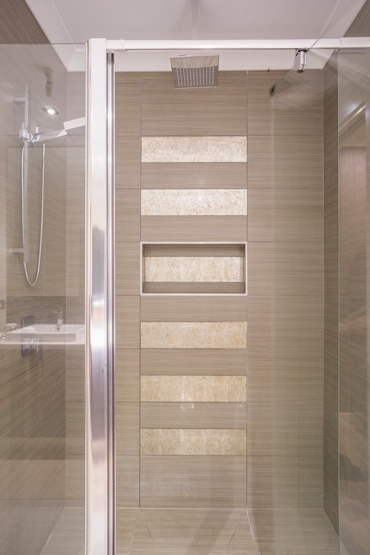 The shower's feature tile band