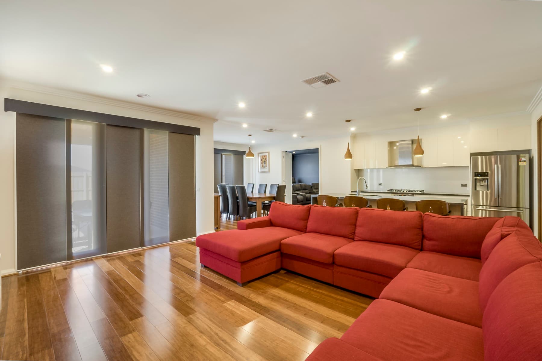 The living room and its red sectional